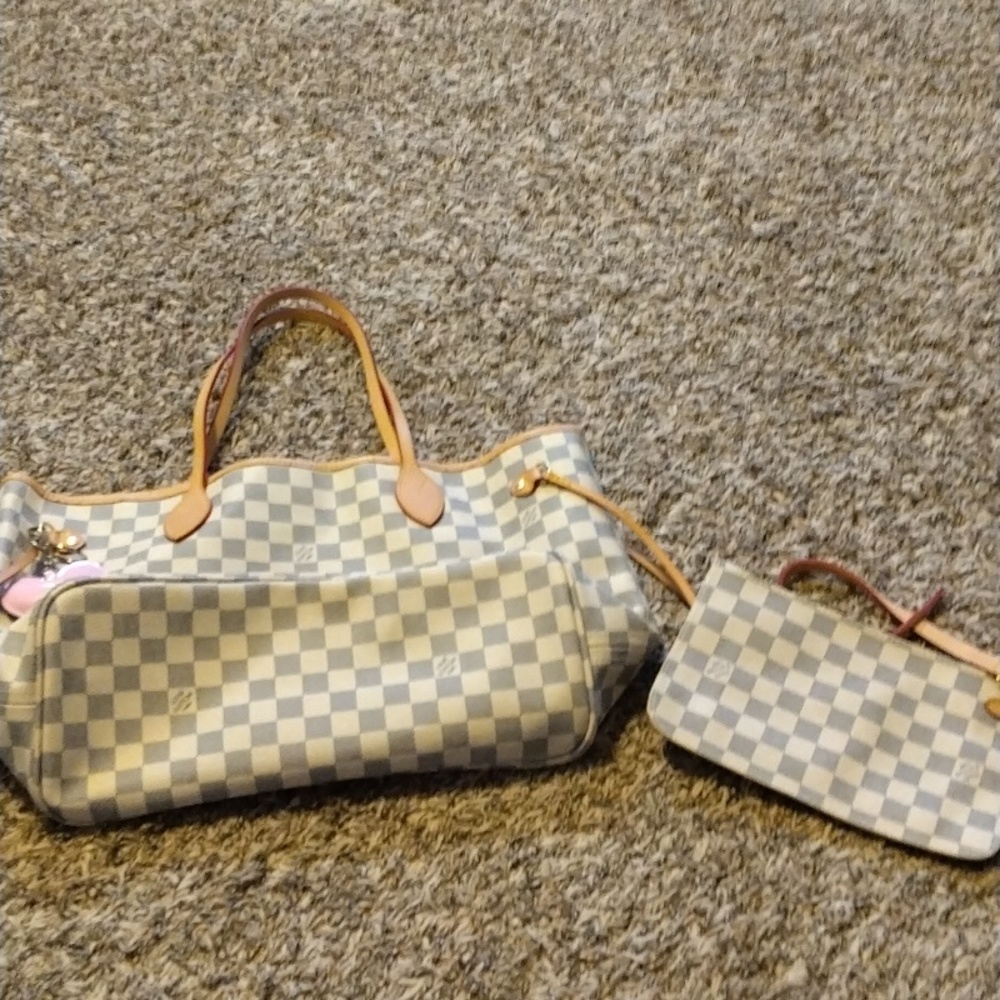 Louis Vuitton purse and comb and makeup pouch